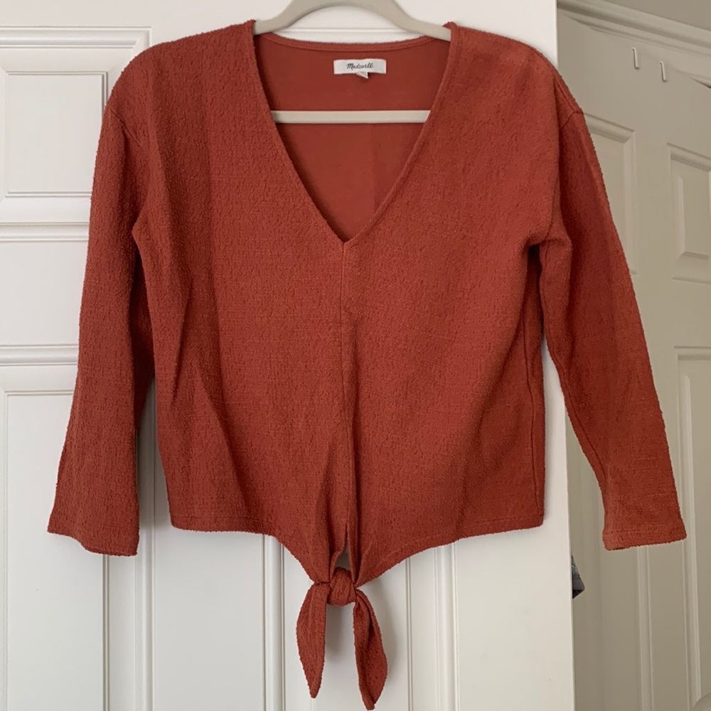 Madewell burnt orange tied, textured long sleeve blouse.